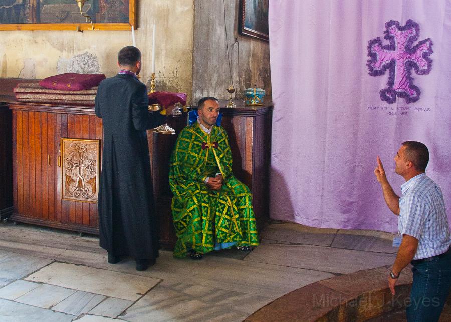 IMG_7010 copy.jpg - Priest waiting for the Next Mass to start At the Birth Place Site